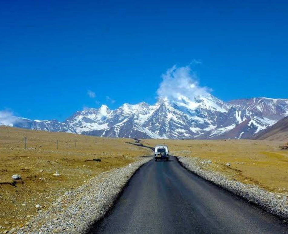 Wide panorama of Gurudongmar Lake and surrounding mountains